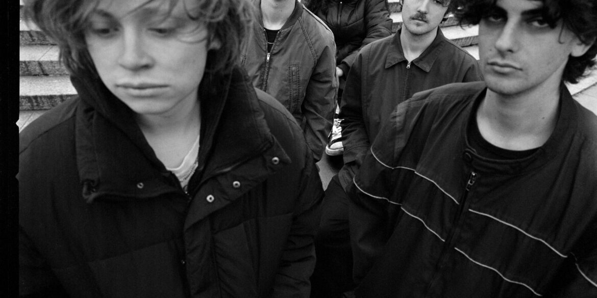 Black and white photo of the five members of the band Been Stellar