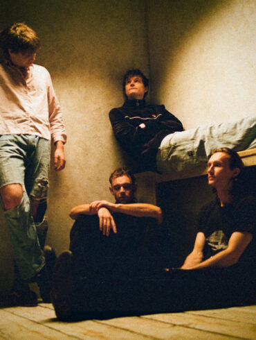 Colour photo of the four band members of Wunderhorse