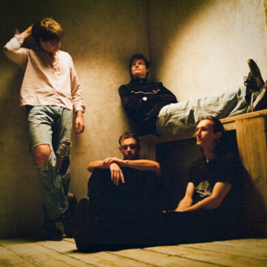 Colour photo of the four band members of Wunderhorse