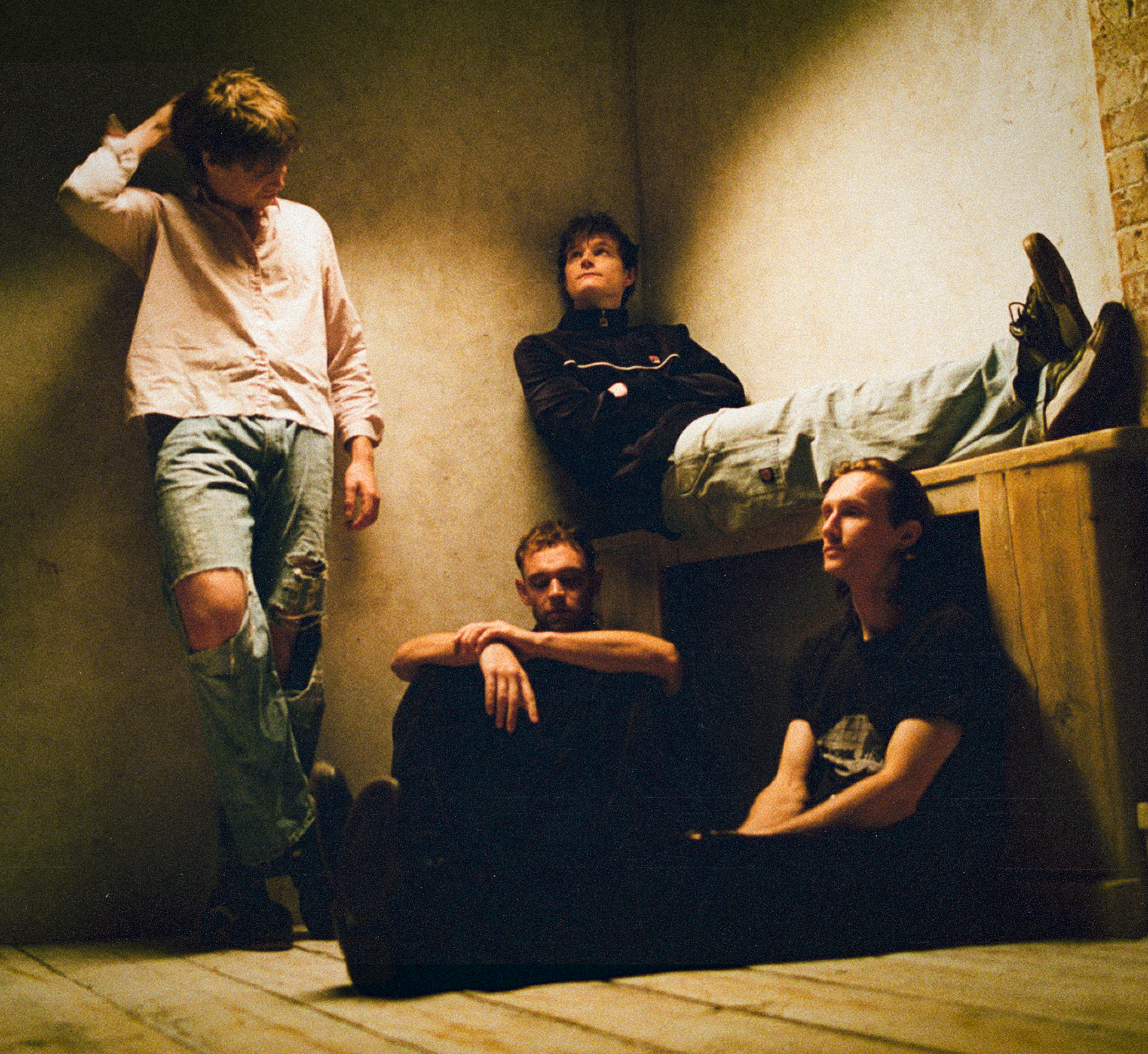 Colour photo of the four band members of Wunderhorse