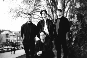 Black and white photo of the band Scattered Ashes